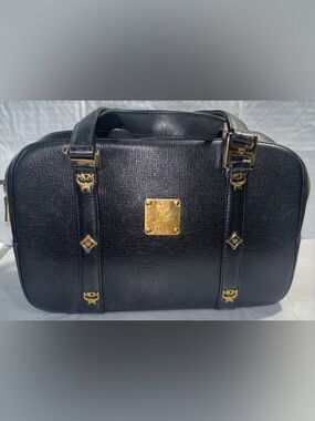 MCM Black Textured Bag with Gold Plaque